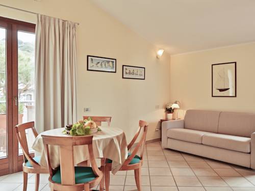 Imagen de la habitación del Hotel Residenza Turistico Alberghiera Corallo. Foto 13