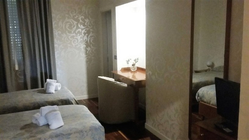 Imagen de la habitación del Hotel Residenza Villa Duse. Foto 17