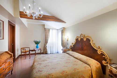Imagen de la habitación del Hotel Residenza d'Epoca San Cassiano. Foto 7
