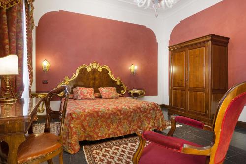 Imagen de la habitación del Hotel Residenza d'Epoca San Cassiano. Foto 9