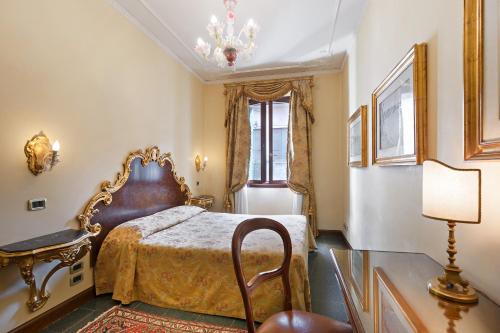 Imagen de la habitación del Hotel Residenza d'Epoca San Cassiano. Foto 10