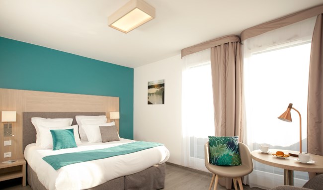 Imagen de la habitación del Hotel Residhome Asnières Park. Foto 3