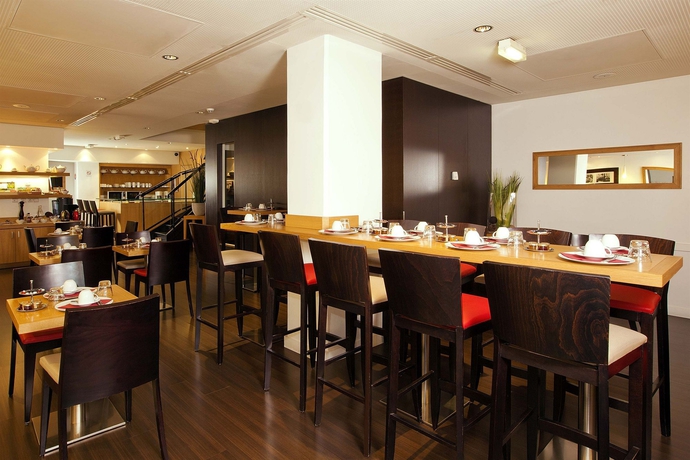 Imagen del bar/restaurante del Hotel Residhome Paris Opéra. Foto 5