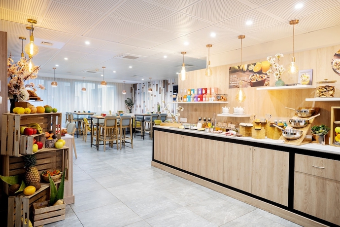 Imagen del bar/restaurante del Hotel Residhome Saint Ouen. Foto 4