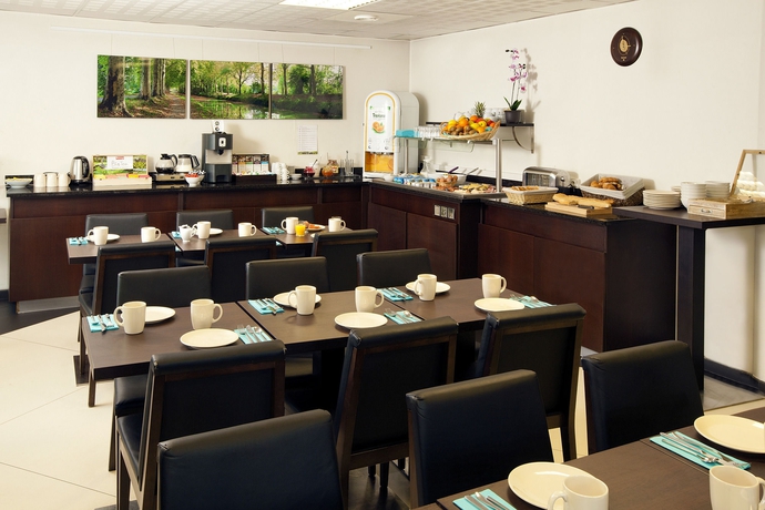 Imagen del bar/restaurante del Hotel Residhome Toulouse Tolosa. Foto 4