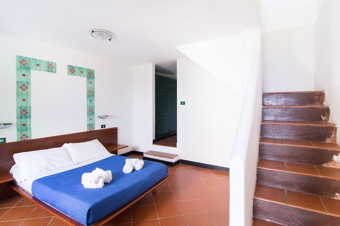 Imagen de la habitación del Hotel Resort Calampiso. Foto 5