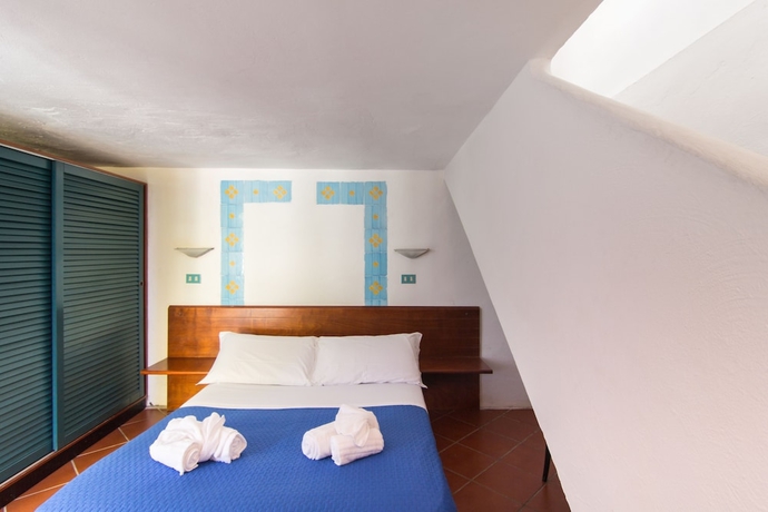 Imagen de la habitación del Hotel Resort Calampiso. Foto 6