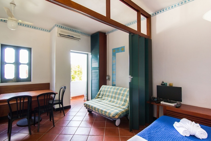 Imagen de la habitación del Hotel Resort Calampiso. Foto 7