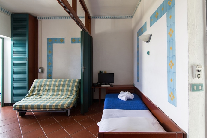 Imagen de la habitación del Hotel Resort Calampiso. Foto 8