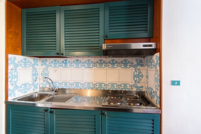 Imagen de la habitación del Hotel Resort Calampiso. Foto 10