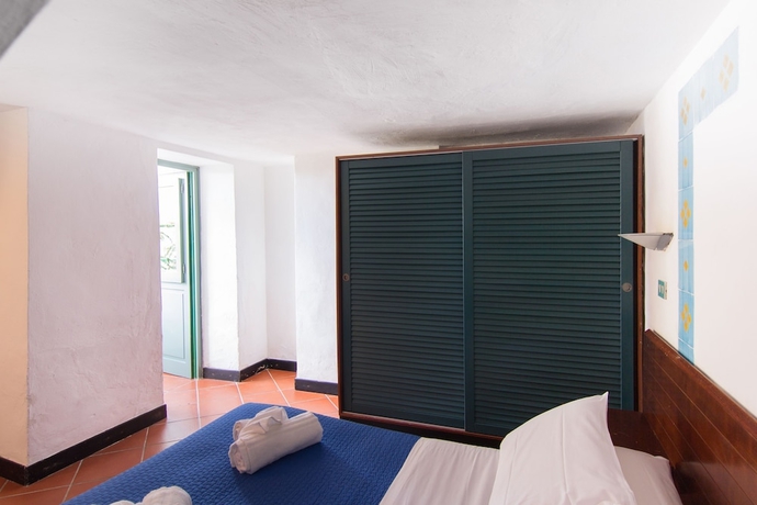 Imagen de la habitación del Hotel Resort Calampiso. Foto 11