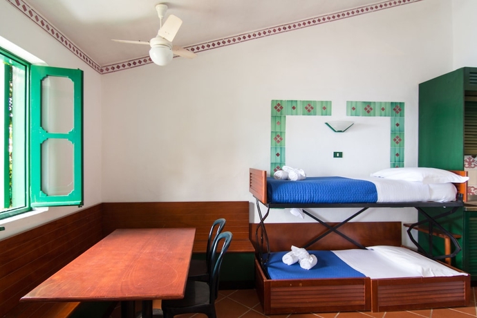 Imagen de la habitación del Hotel Resort Calampiso. Foto 14