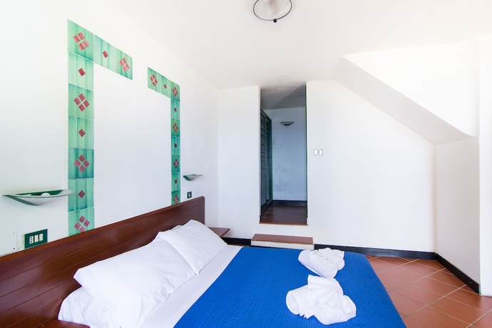 Imagen de la habitación del Hotel Resort Calampiso. Foto 16