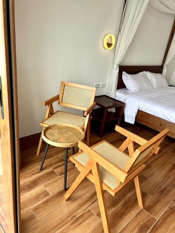 Imagen de la habitación del Hotel Resort Deja Vu. Foto 13