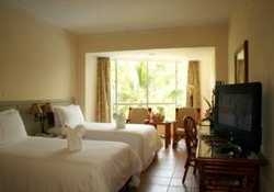 Imagen de la habitación del Hotel Resort Golden Palm. Foto 6