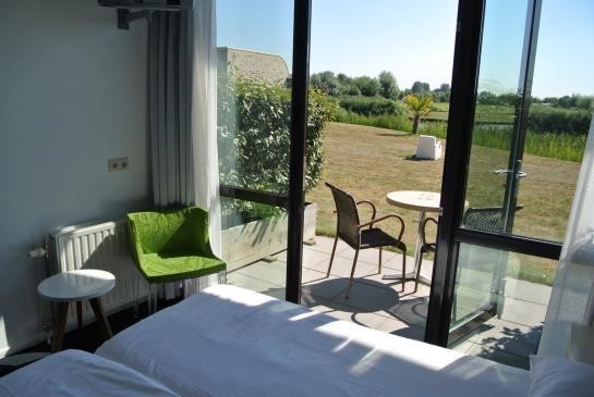 Imagen de la habitación del Hotel Resort Land En Zee. Foto 2