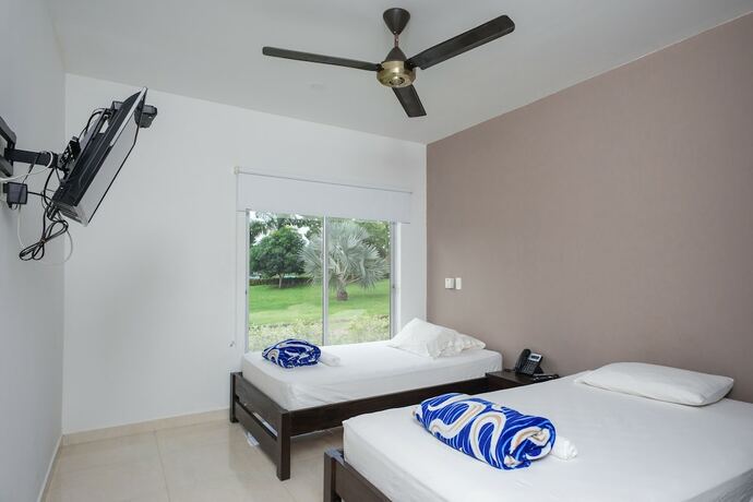 Imagen de la habitación del Hotel Resort Marianza. Foto 11