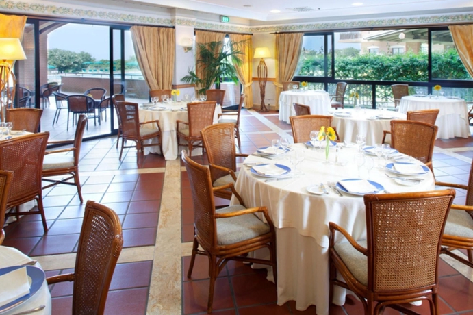 Imagen del bar/restaurante del Hotel Resort Marina Di Castello Golf and Spa. Foto 3