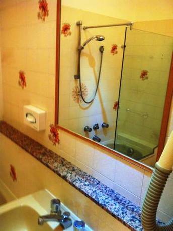 Imagen de la habitación del Hotel Resort Marinella. Foto 10