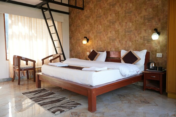 Imagen de la habitación del Hotel Resort Prakriti Unwind. Foto 24