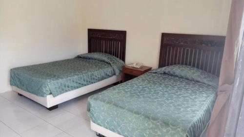 Imagen de la habitación del Hotel Resort Prima Sangkanhurip. Foto 12