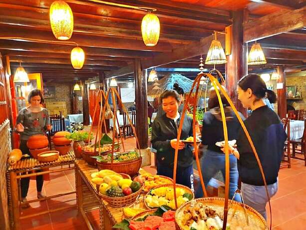 Imagen del bar/restaurante del Hotel Resort P&ugrave; Lu&ocirc;ng Boutique Garden. Foto 11