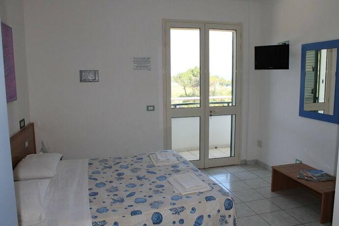 Imagen de la habitación del Hotel Resort Puntacassano. Foto 16