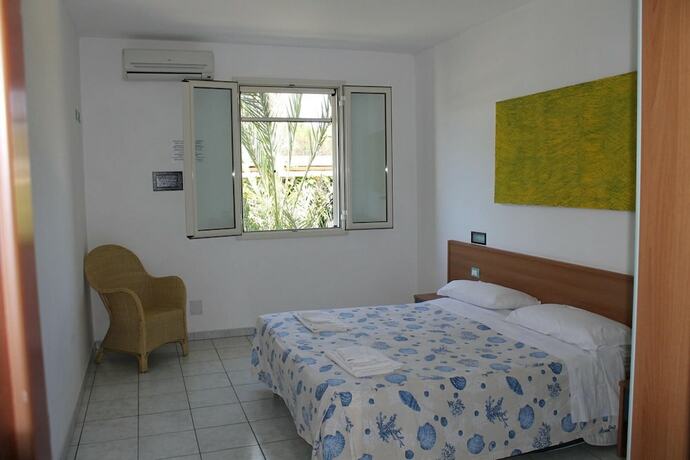 Imagen de la habitación del Hotel Resort Puntacassano. Foto 17