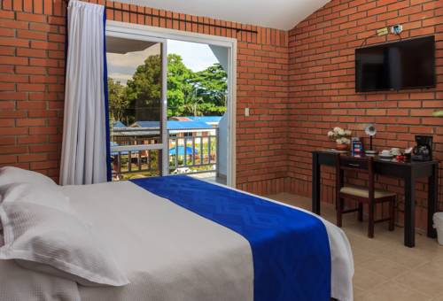 Imagen de la habitación del Hotel Resort Villa Del Sol. Foto 2