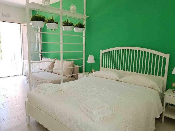Imagen de la habitación del Hotel Resort Villa Isola 21. Foto 15