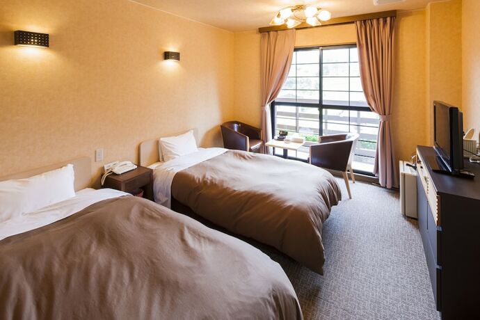 Imagen de la habitación del Hotel Resort inn Yunogo. Foto 14