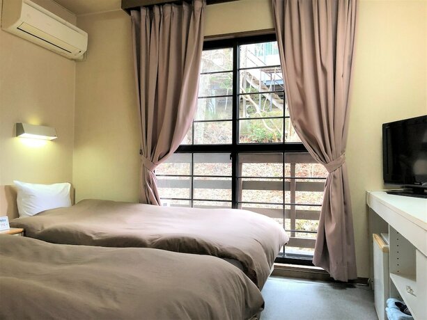 Imagen de la habitación del Hotel Resort inn Yunogo. Foto 15