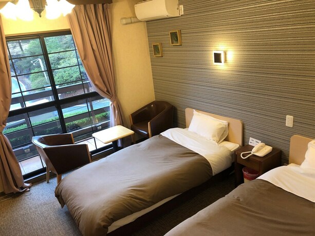 Imagen de la habitación del Hotel Resort inn Yunogo. Foto 16