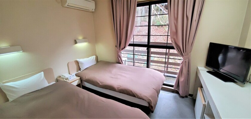 Imagen de la habitación del Hotel Resort inn Yunogo. Foto 22