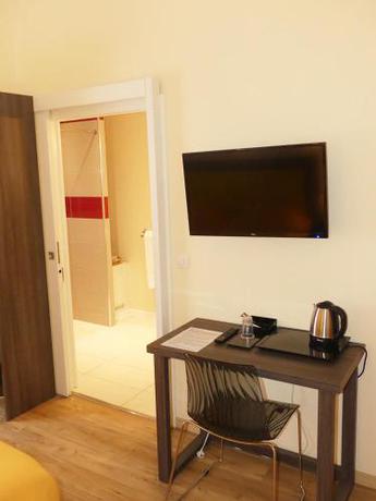 Imagen de la habitación del Hotel Restaurant Aux Deux Roses. Foto 4