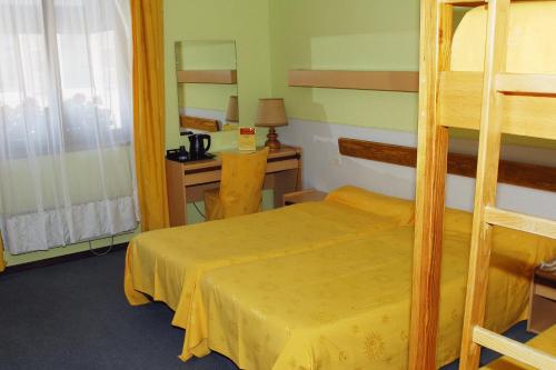 Imagen de la habitación del Hotel Restaurant Aux Deux Roses. Foto 6