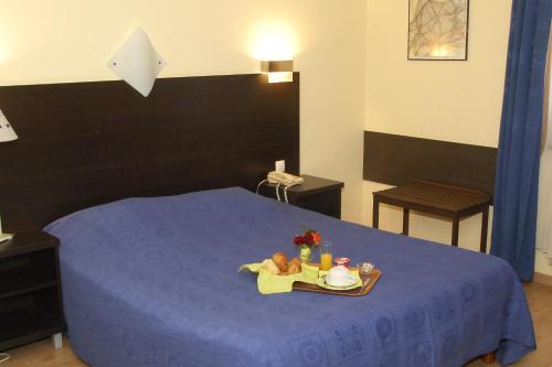 Imagen de la habitación del Hotel Restaurant Aux Deux Roses. Foto 7