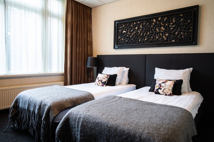 Imagen de la habitación del Hotel Restaurant De Beurs. Foto 3