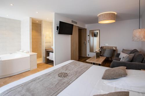 Imagen de la habitación del Hotel Restaurant Du Lac De Madine. Foto 8