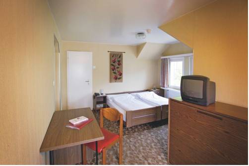 Imagen de la habitación del Hotel - Restaurant Eierhals Am &auml;gerisee. Foto 4