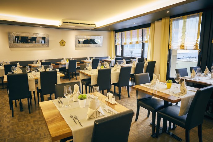 Imagen del bar/restaurante del Hotel Restaurant Elite Visp. Foto 5