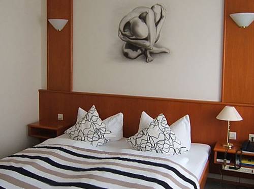 Imagen de la habitación del Hotel Restaurant Gr&uuml;ner Baum Und Altes Tor. Foto 4