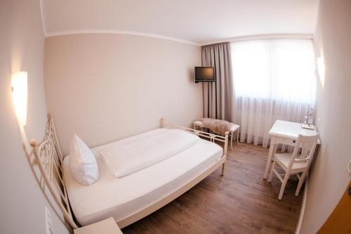 Imagen de la habitación del Hotel Restaurant Hirsch. Foto 7