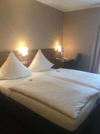 Imagen de la habitación del Hotel Restaurant Im Park. Foto 7