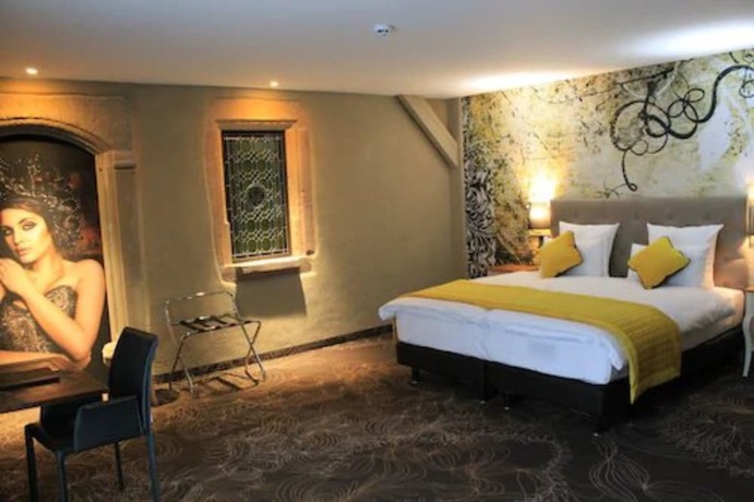 Imagen de la habitación del Hotel Restaurant L'Orchidee. Foto 2