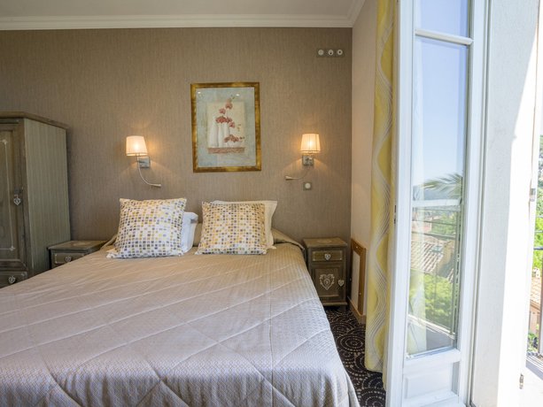 Imagen de la habitación del Hotel Restaurant Le Bellevue, Bormes-les-Mimosas. Foto 8