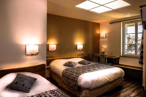 Imagen de la habitación del Hotel Restaurant Le Cheval Rouge. Foto 6