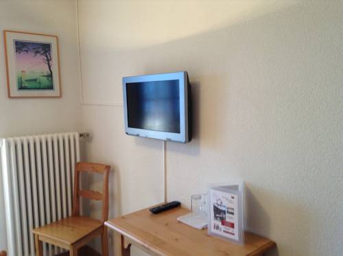 Imagen de la habitación del Hotel Restaurant Le Gruyerien. Foto 11
