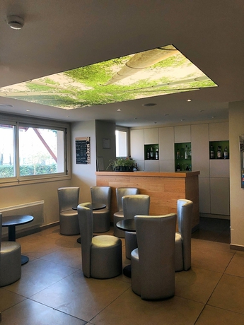 Imagen del bar/restaurante del Hotel Restaurant Les Loges. Foto 2