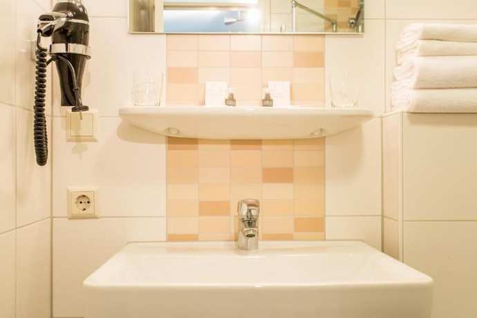 Imagen de la habitación del Hotel Restaurant Ruimzicht. Foto 10